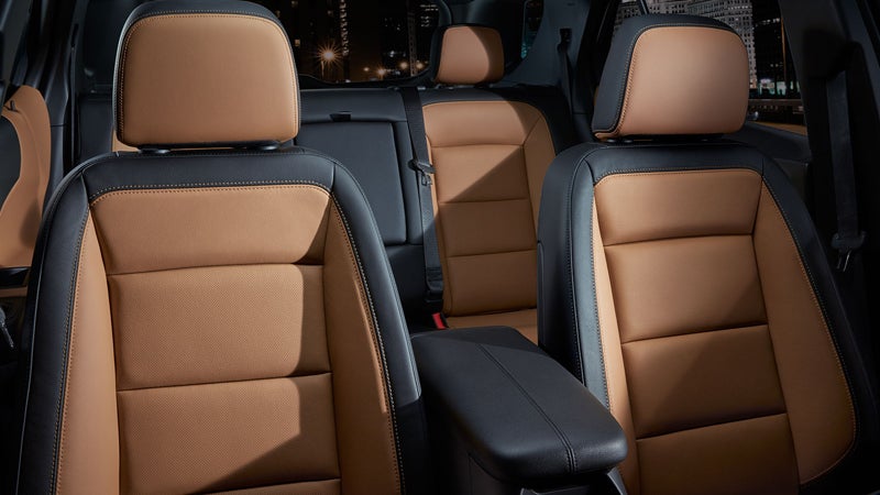 Rear interior view of the Chevrolet Equinox showcasing two-tone leather seats and spacious second row.