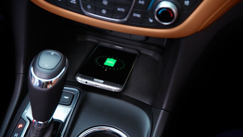Chevrolet Equinox center console with wireless smartphone charging feature.