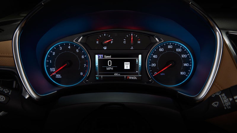 Chevrolet Equinox driver instrument cluster with illuminated gauges and digital speedometer.