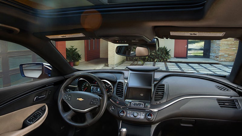 Driver’s seat perspective of the 2018 Impala interior with leather trim and dashboard view