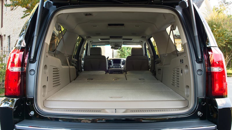Rear view of the 2017 Chevrolet Suburban's cargo area with seats folded flat.