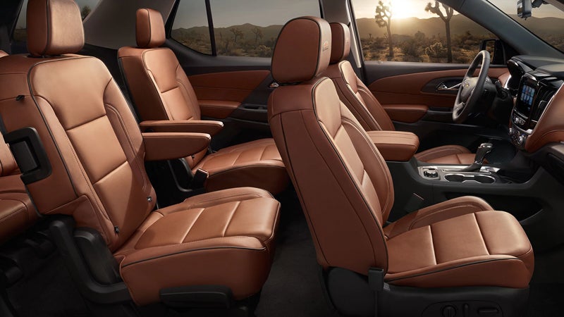 Interior of the 2018 Chevrolet Traverse showcasing premium brown leather seating and spacious layout.
