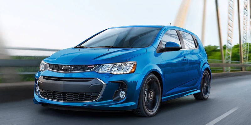 Blue Chevrolet Sonic in motion on the Bridge