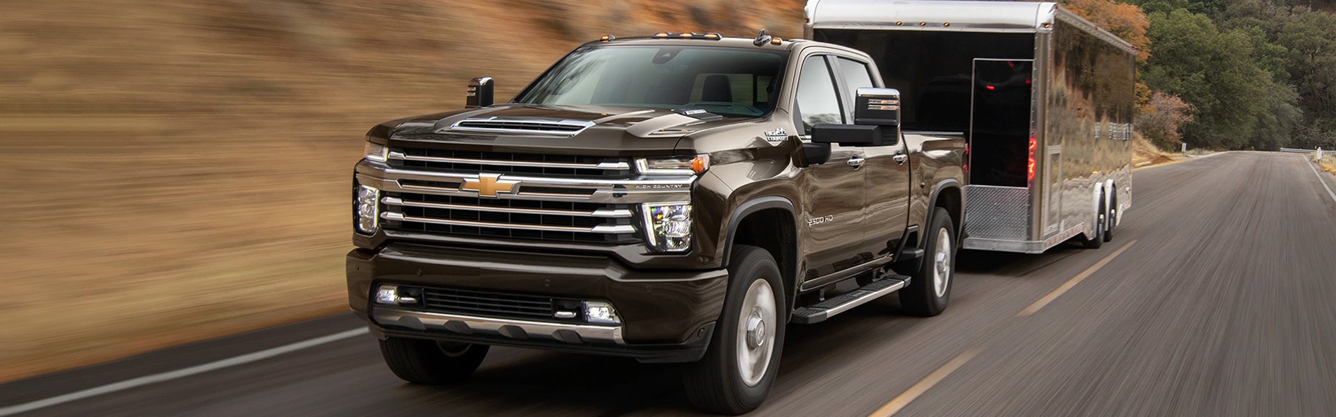 Chevrolet Silverado 2500HD towing a large container